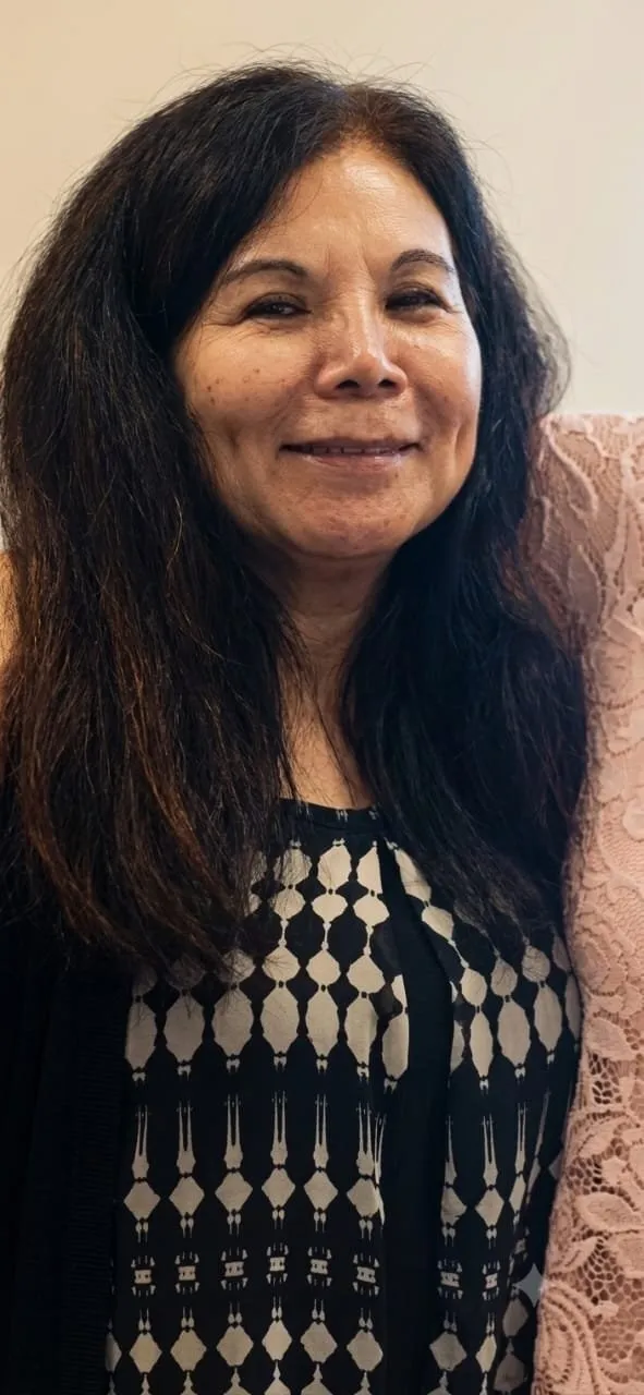 Portrait of Marilu Schneider.